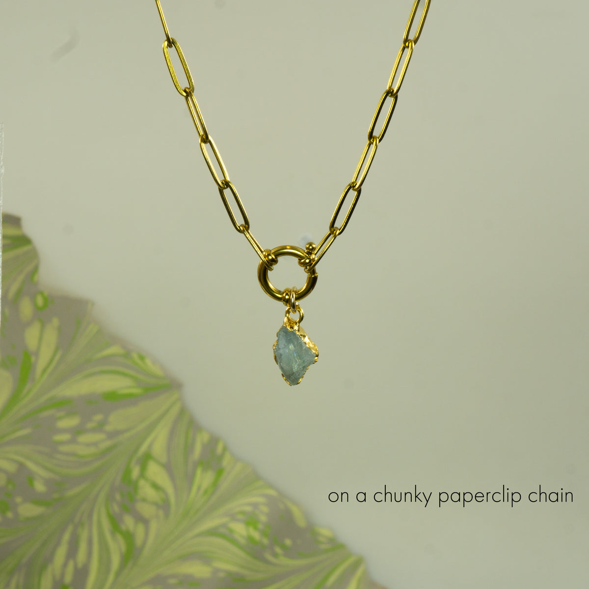 Gold chunky paperclip chain necklace with a Aquamarine teardrop pendant