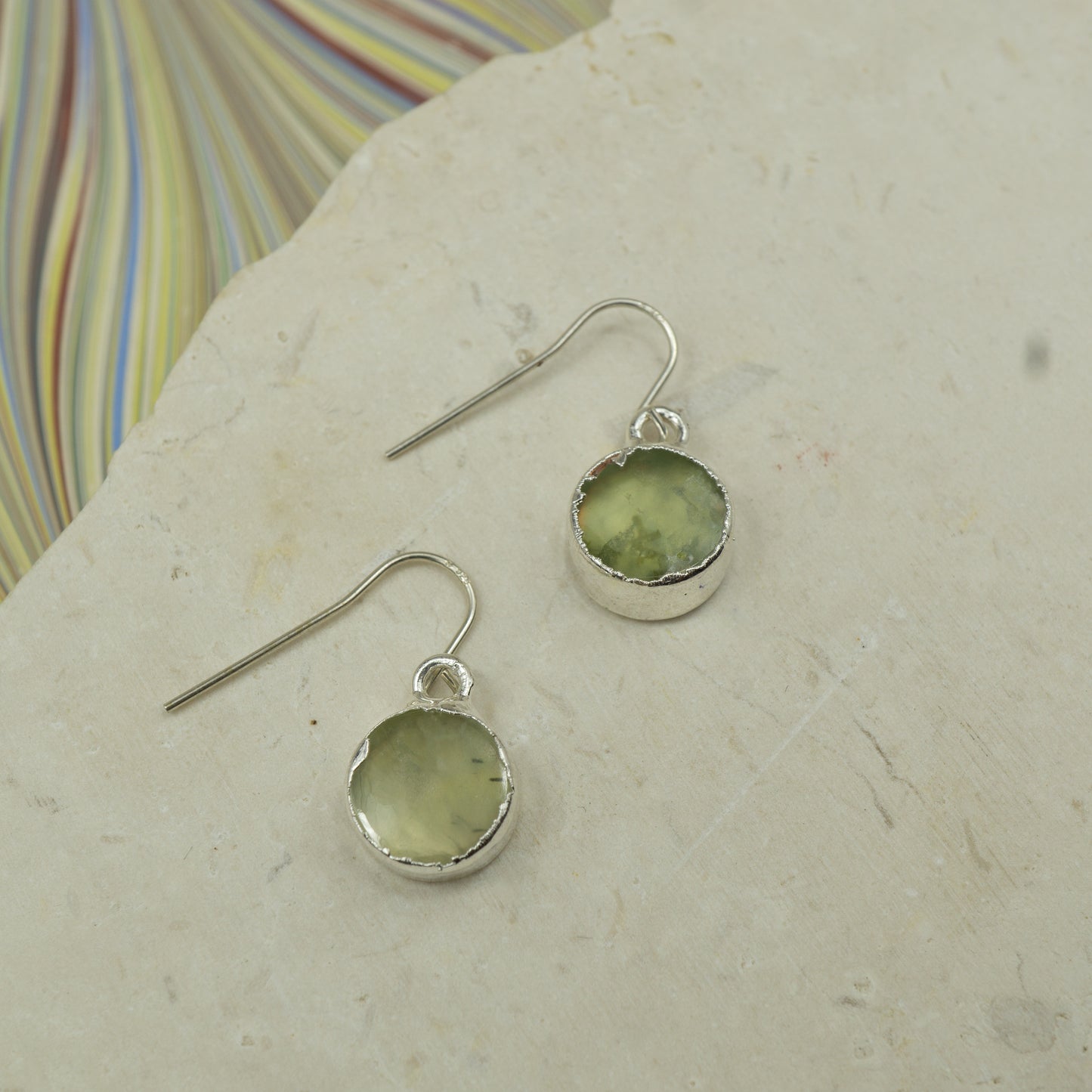 Round raw Blue amazonite earrings on hooks finished in silver