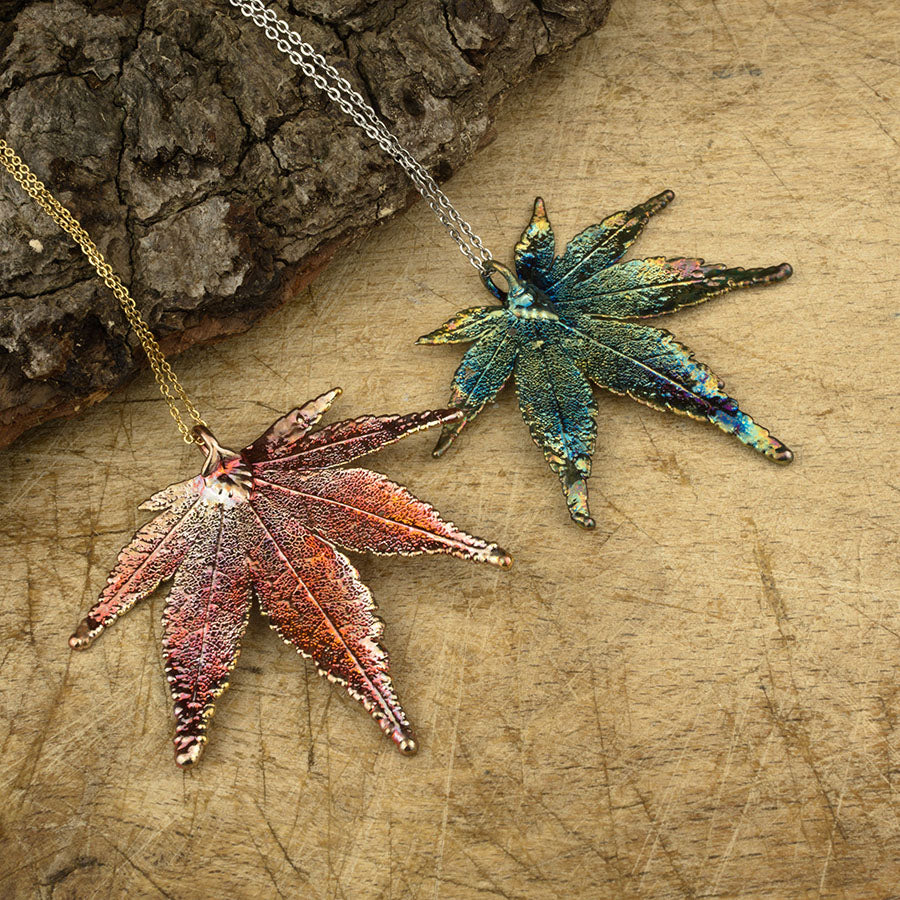 real Japanese maple leaf pendant in copper and blue patinations on chains.