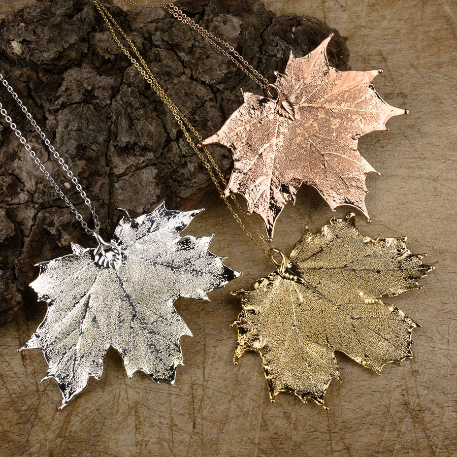 real Canadian maple leaf pendants in silver, gold and rose gold on chains
