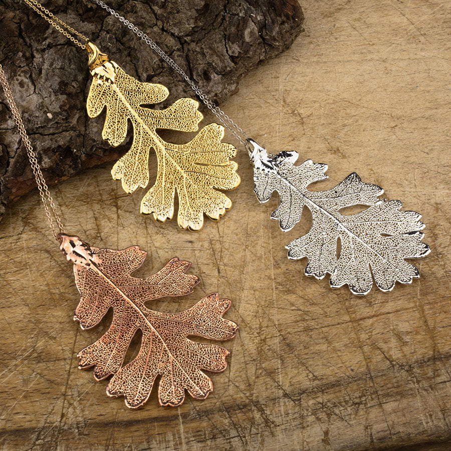 real oak leaf pendant in gold, silver and rose gold on chains