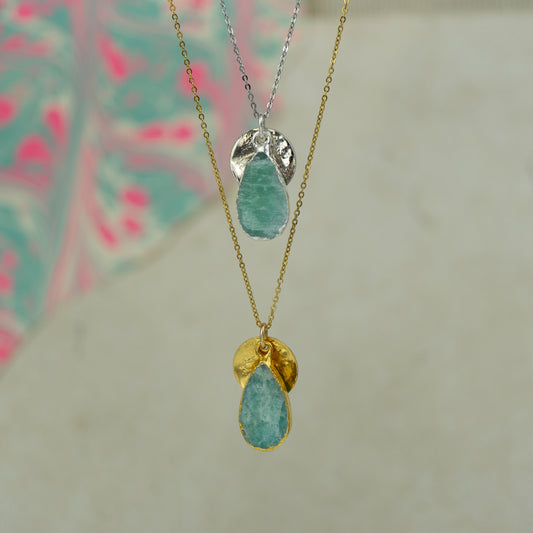 raw blue and green amazonite teardrop pear shaped pendant with small back disk on a chain in gold and silver.