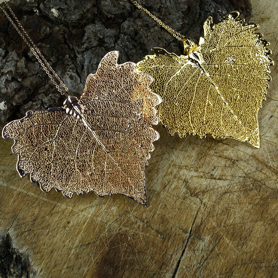 Real cottonwood leaf pendants in rose gold and gold finishing.