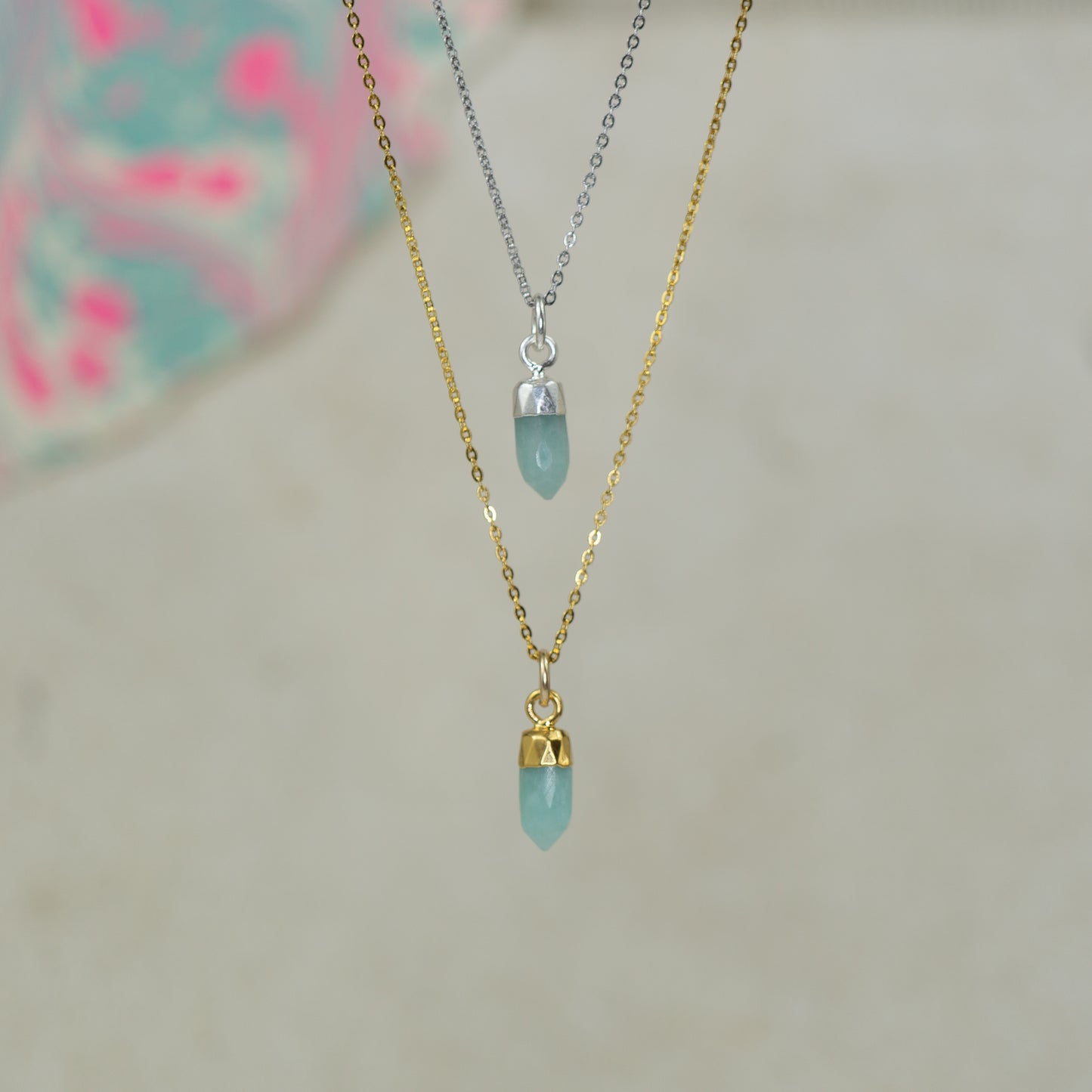 blue amazonite pendant in gold and silver layered necklace
