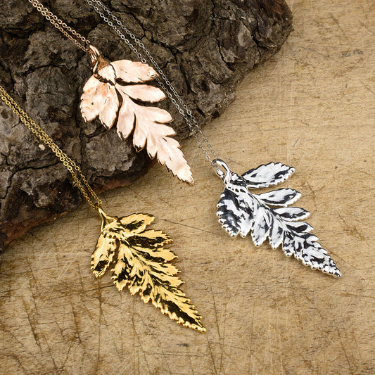 Real fern leaf pendants in gold, silver and rose gold on chains