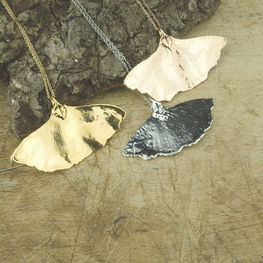 Real gingko leaf pendants in gold, silver and rose gold on chains